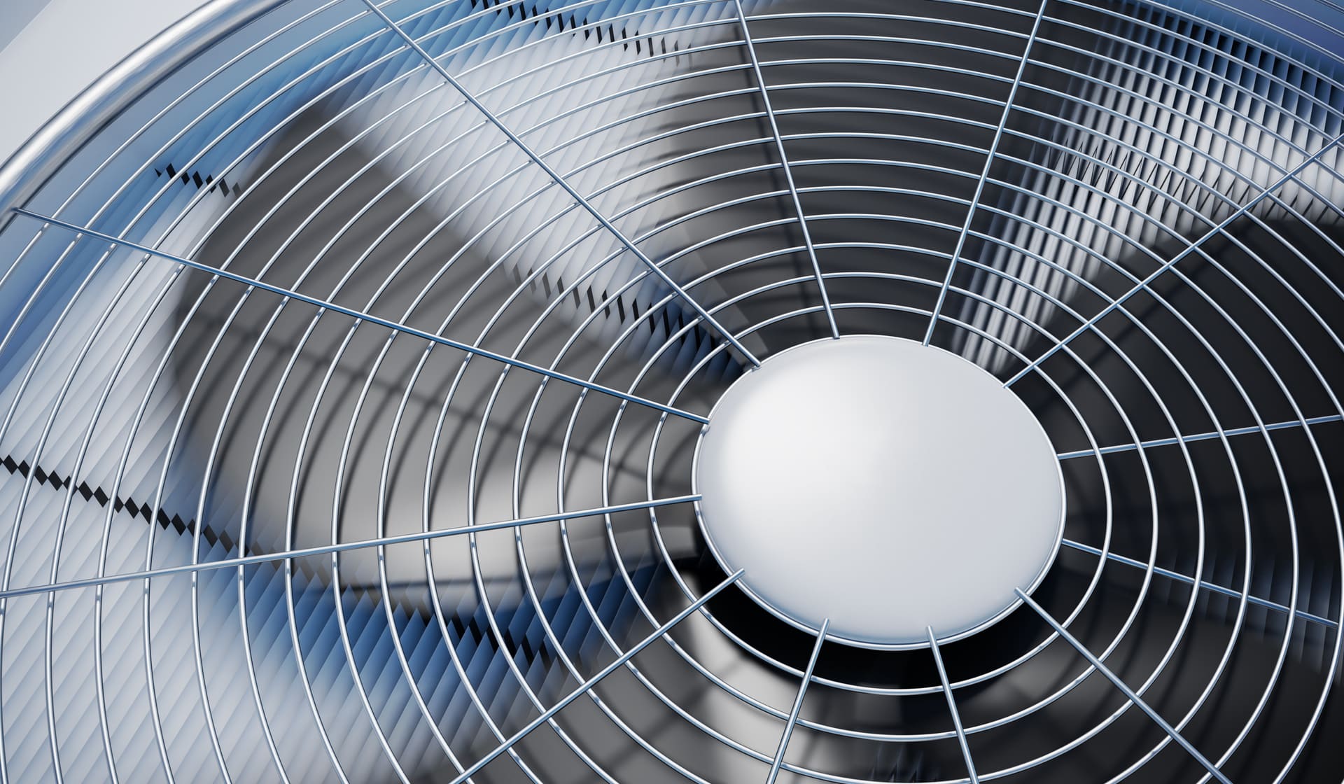 Close-up view of an HVAC condenser fan